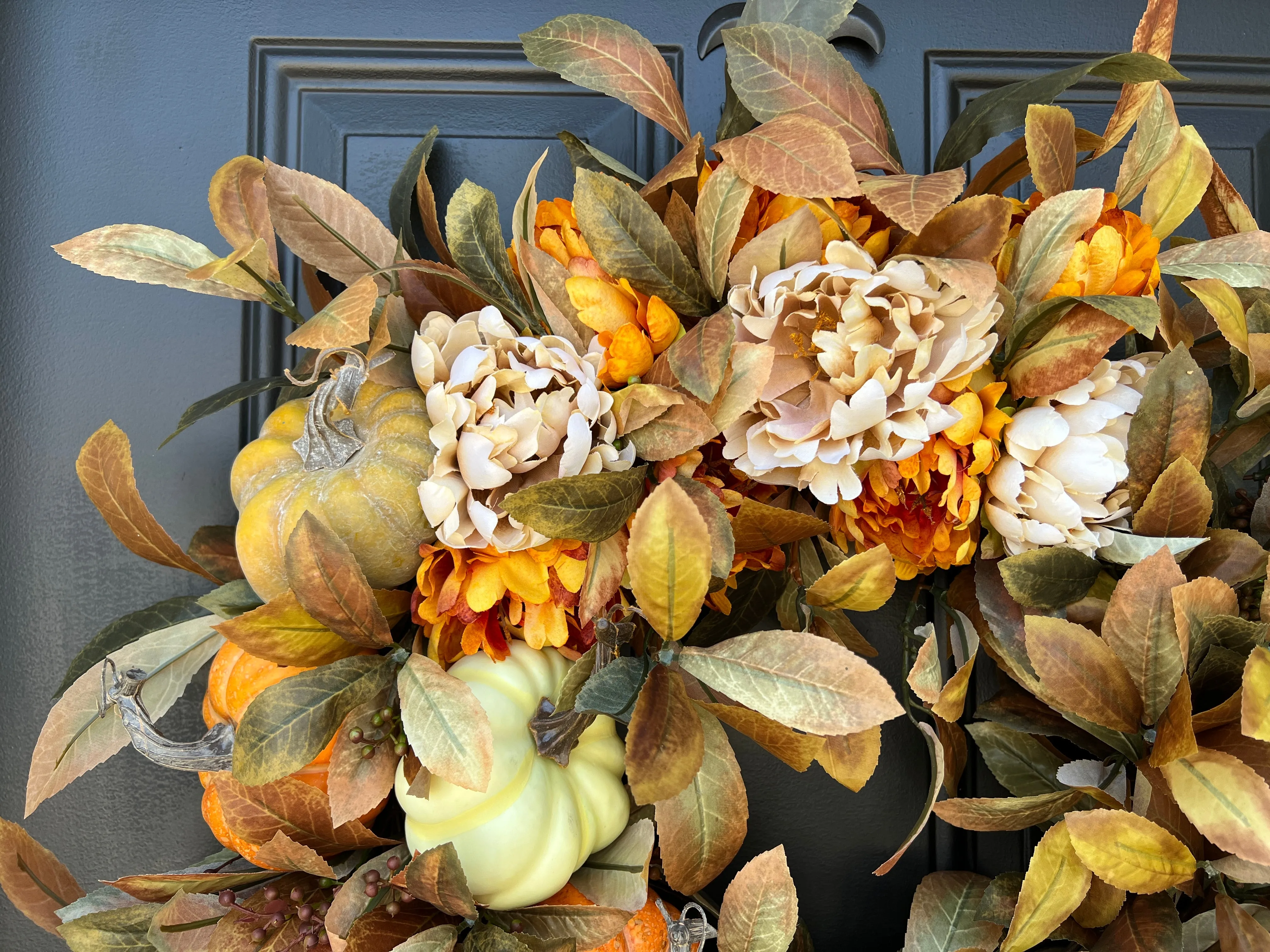 Seasonal Cascading Wreath with Orange, Cream, and Green Pumpkins